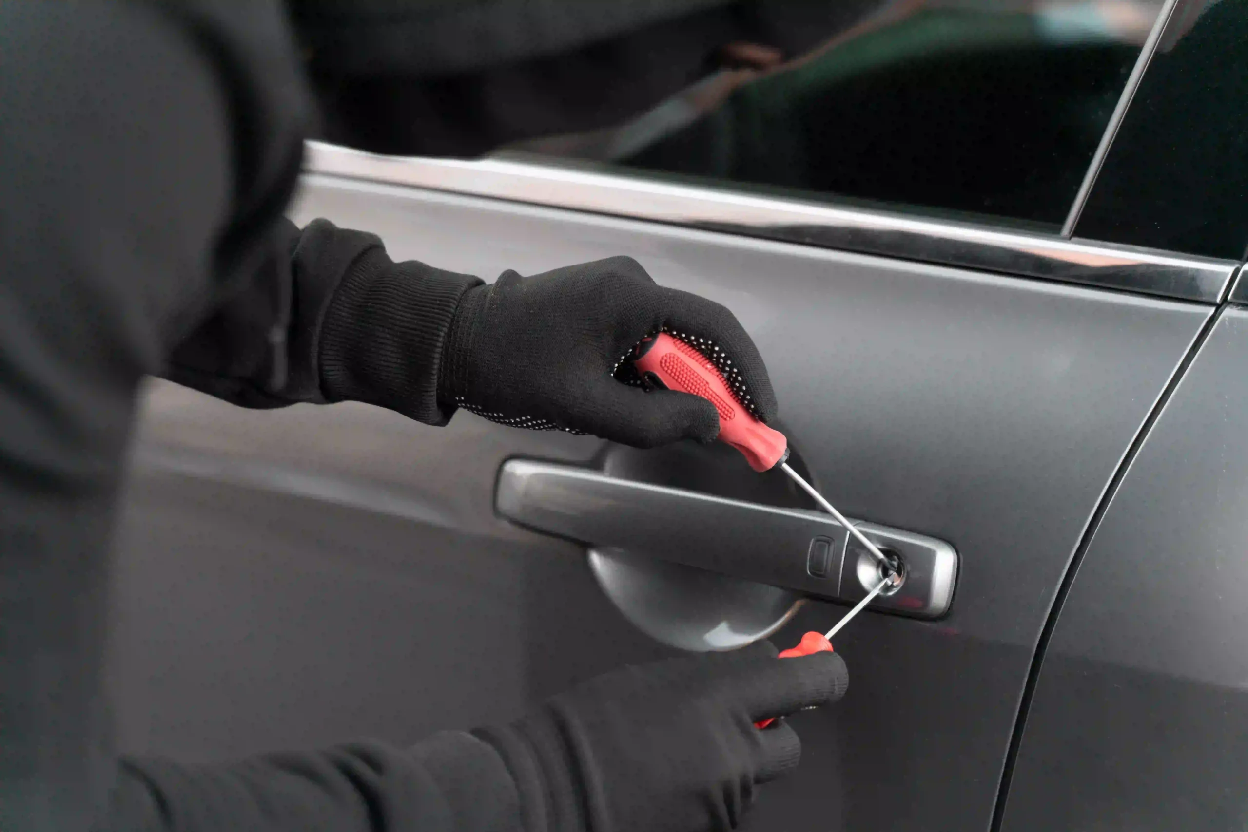 Locksmith Ocoee creating duplicate car keys at a client’s location