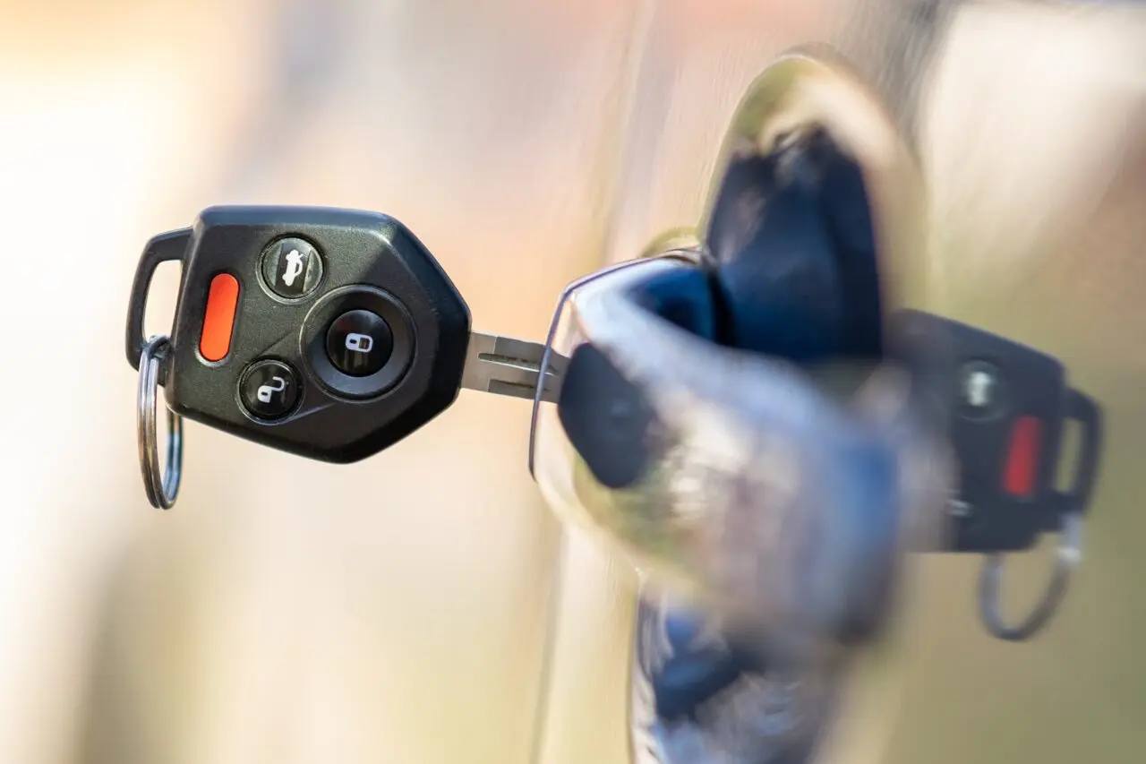 Expert Locksmith Kissimmee technician replacing a car key fob for quick access.